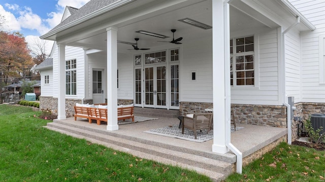 view of patio featuring french doors, ceiling fan, and an outdoor hangout area