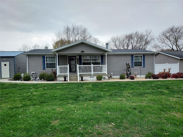 view of front facade with a porch and a front yard