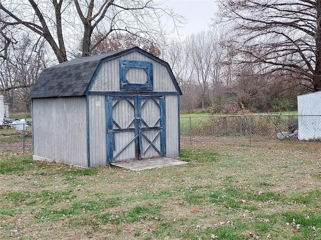 view of outdoor structure with a yard