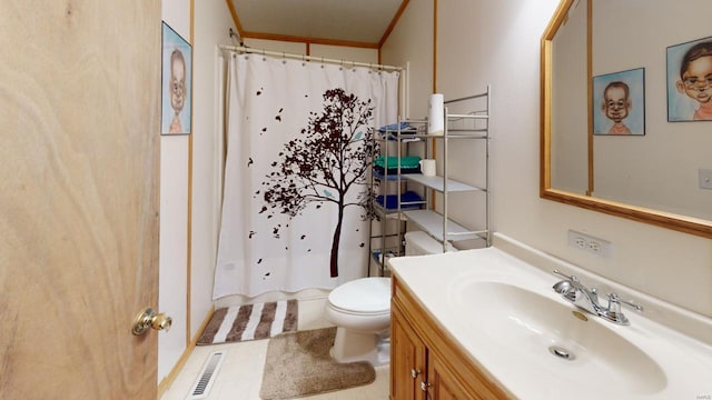 bathroom with a shower with curtain, tile patterned flooring, crown molding, toilet, and vanity