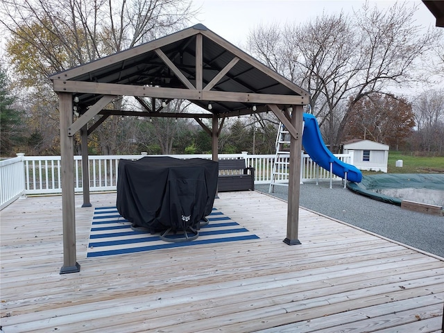 wooden deck featuring a gazebo