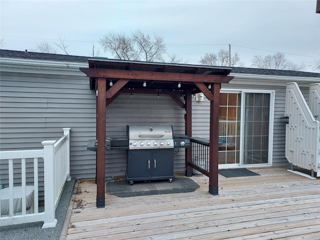 wooden deck featuring grilling area