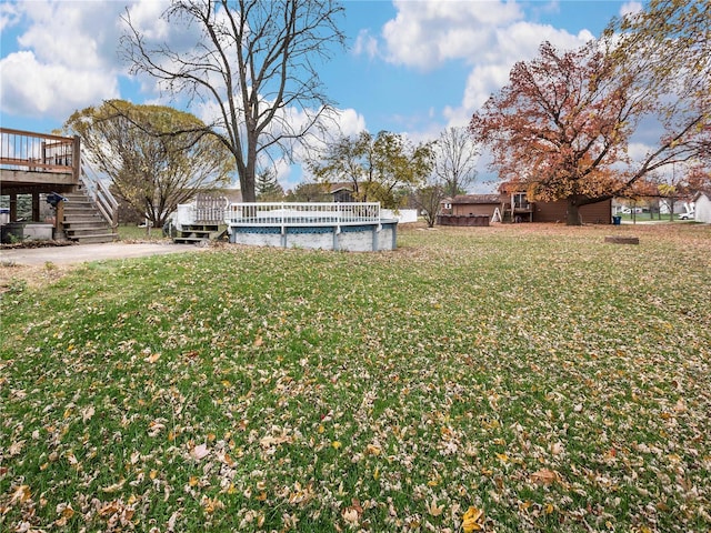 view of yard with a deck