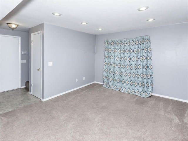 spare room with carpet floors