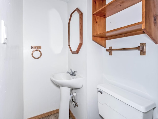 bathroom featuring toilet