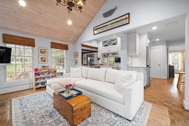 living room featuring high vaulted ceiling, light parquet floors, plenty of natural light, and wood ceiling