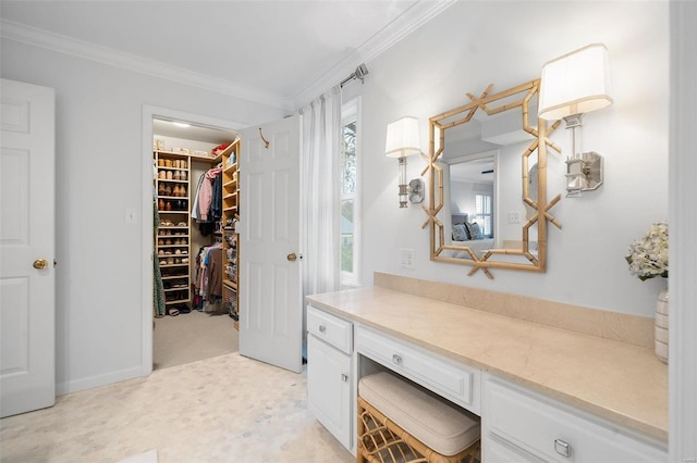 bathroom featuring vanity and crown molding