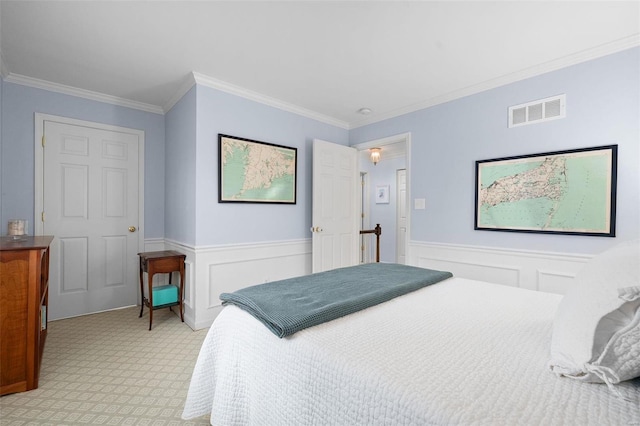 bedroom featuring crown molding