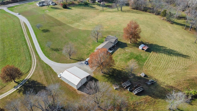 birds eye view of property featuring a rural view