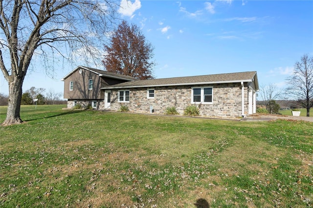 back of house with a yard