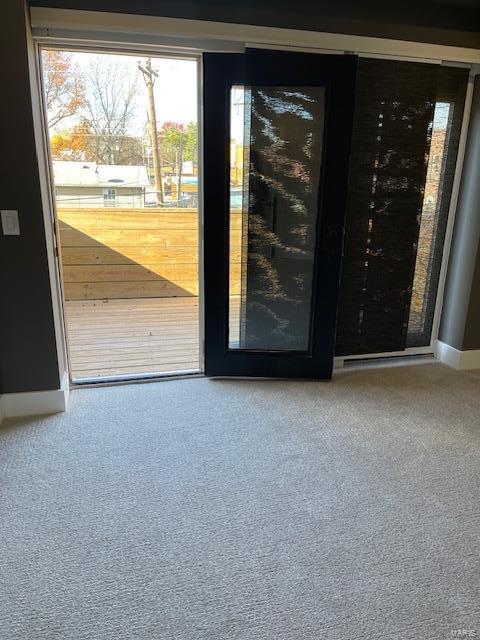 entryway with carpet