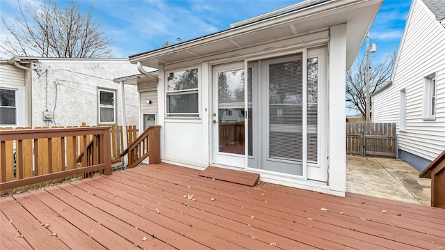 wooden deck featuring fence