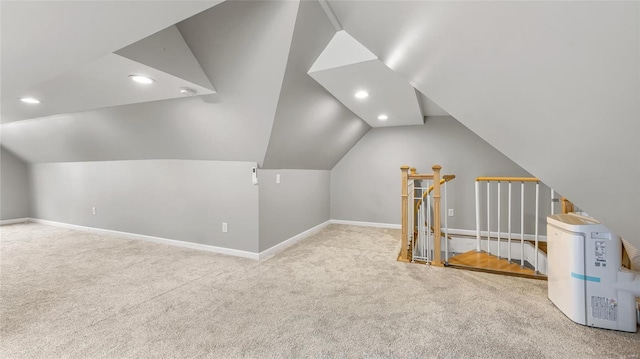 bonus room featuring light carpet, vaulted ceiling, recessed lighting, and baseboards