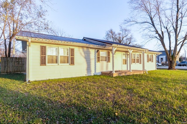 ranch-style house with a front yard