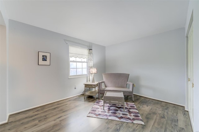 living area with wood-type flooring