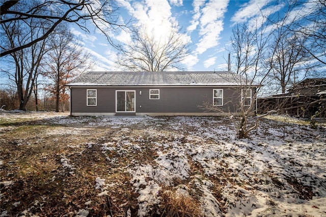 view of snow covered property