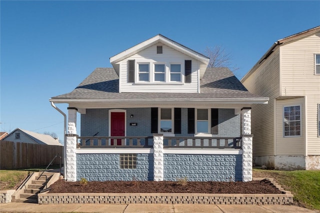 view of front of property featuring covered porch