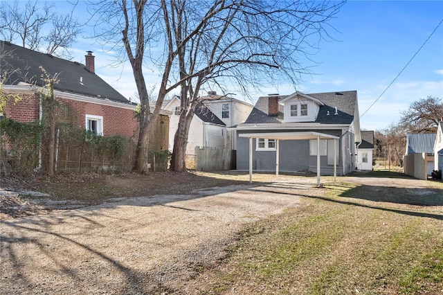 exterior space featuring a front yard