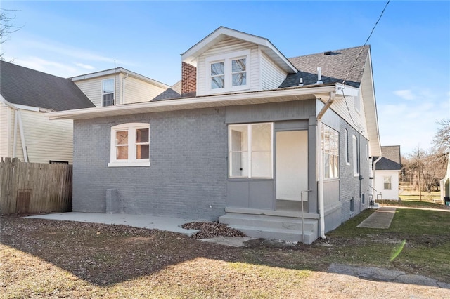 exterior space with a front lawn