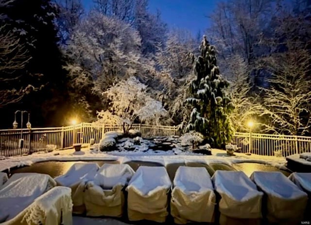 view of snow covered pool