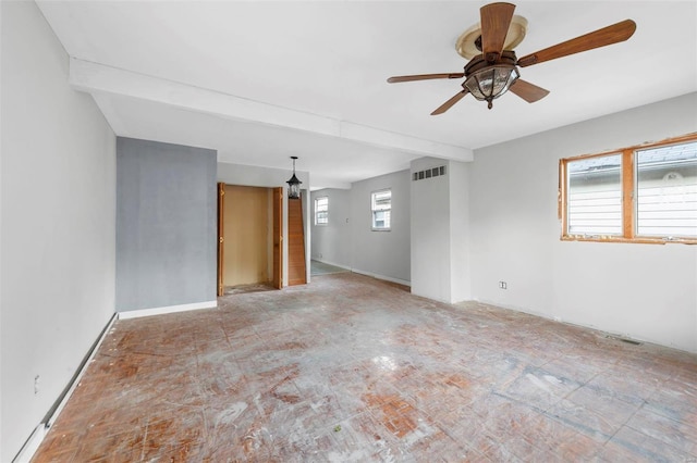 empty room with beam ceiling, ceiling fan, and a healthy amount of sunlight