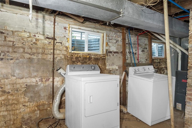 laundry area featuring washing machine and clothes dryer