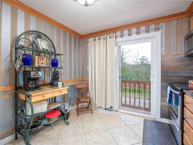 doorway to outside featuring crown molding and light tile patterned floors