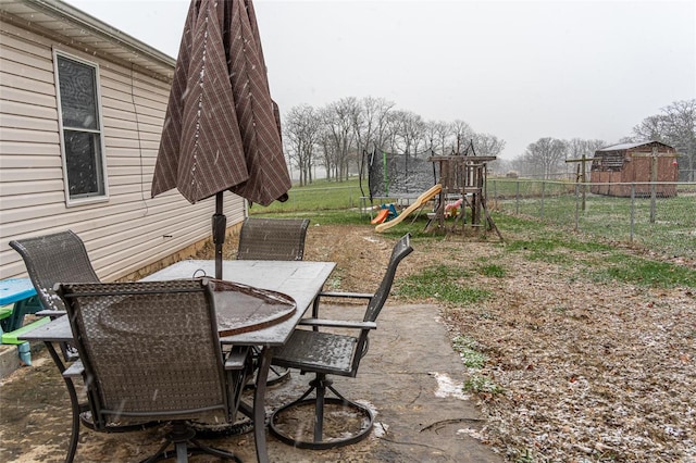 view of patio with a playground