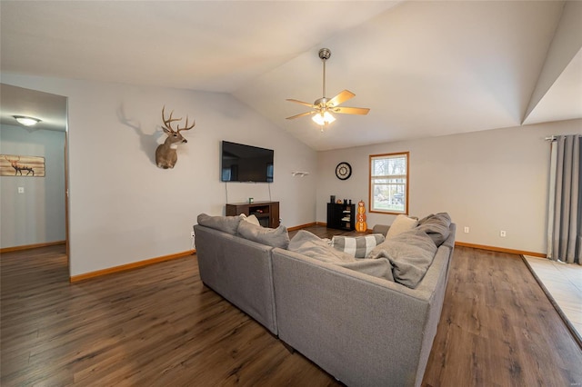 living room featuring hardwood / wood-style floors, ceiling fan, and lofted ceiling