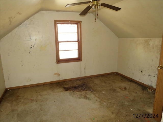 additional living space featuring ceiling fan and vaulted ceiling