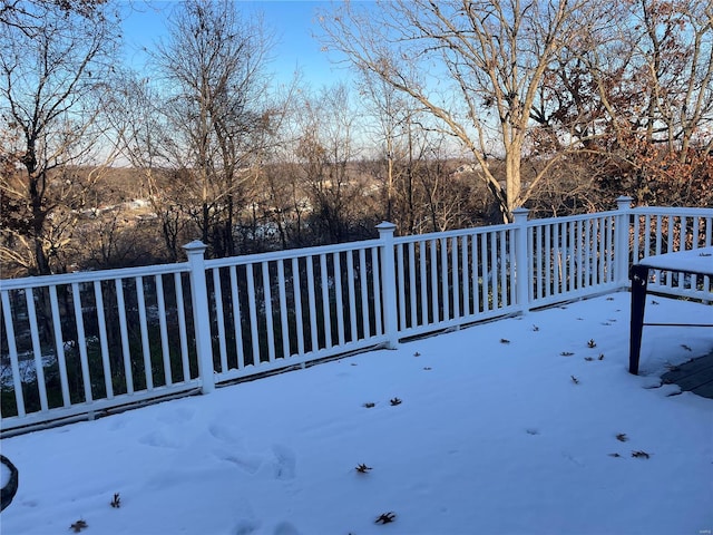 view of snow covered patio