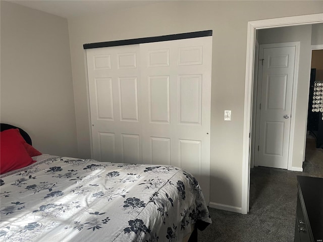 carpeted bedroom with a closet