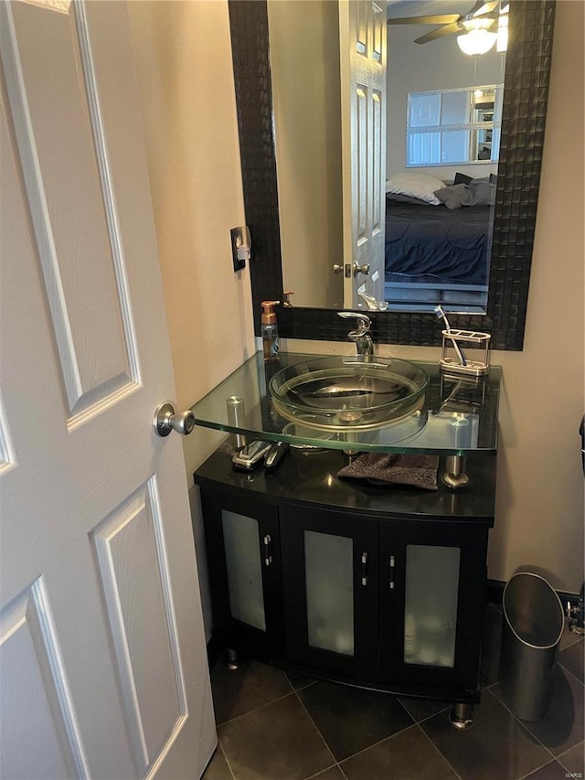 bathroom featuring vanity, tile patterned floors, and ceiling fan