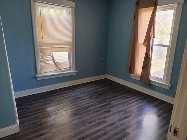 empty room featuring dark hardwood / wood-style floors