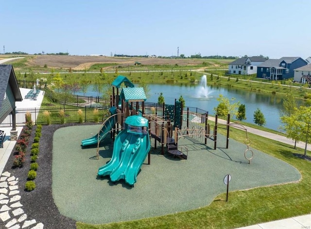 view of jungle gym featuring a water view