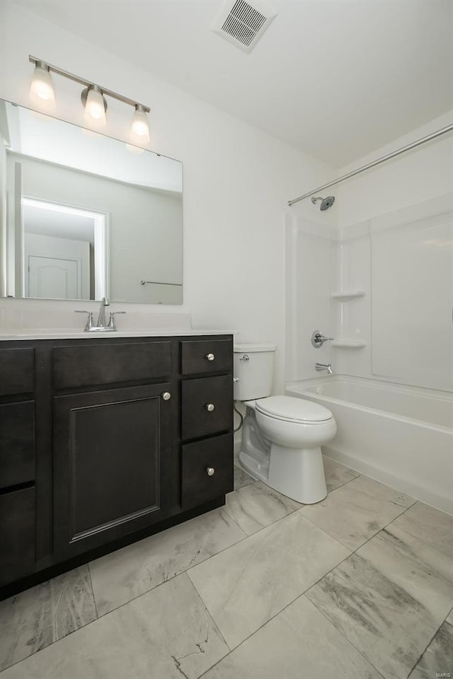 full bathroom featuring vanity, shower / bathtub combination, and toilet