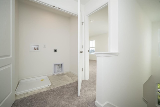 laundry room featuring electric dryer hookup, light carpet, and hookup for a washing machine