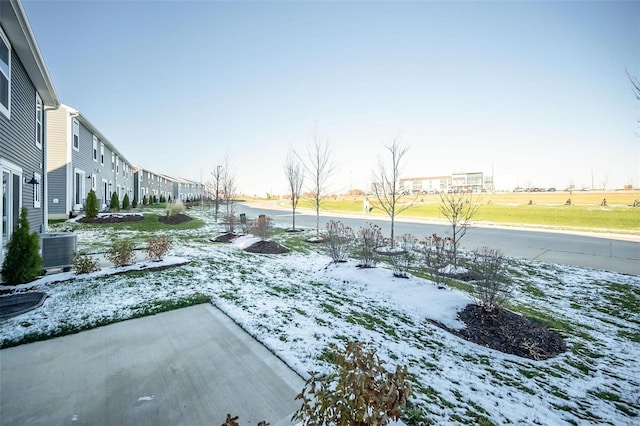 snowy yard with cooling unit