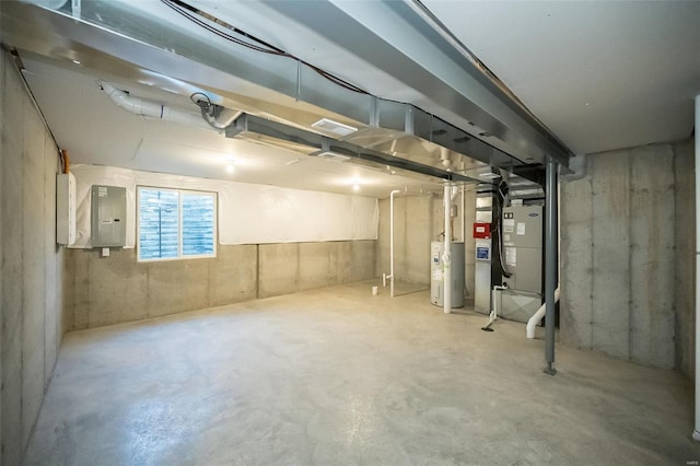 basement with heating unit, electric panel, and water heater