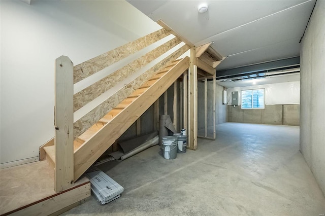 attic featuring electric panel