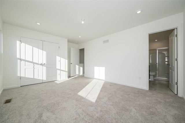 empty room featuring carpet flooring