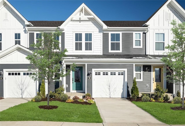 view of front of house with a garage and a front lawn