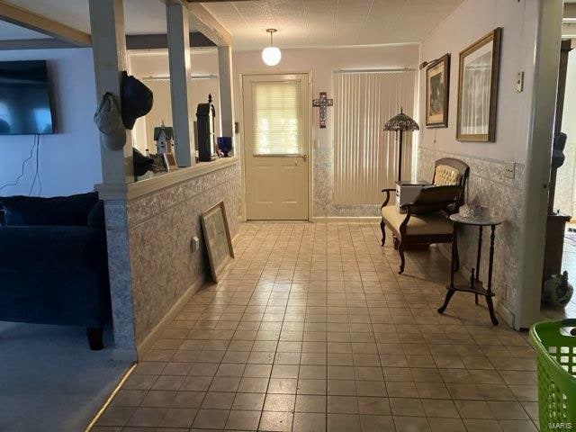 foyer with tile patterned flooring