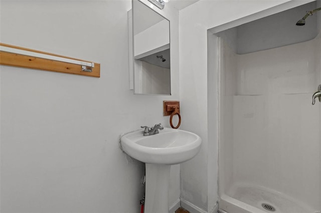 bathroom featuring walk in shower