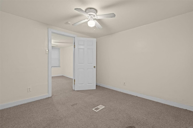 unfurnished bedroom with ceiling fan and light colored carpet