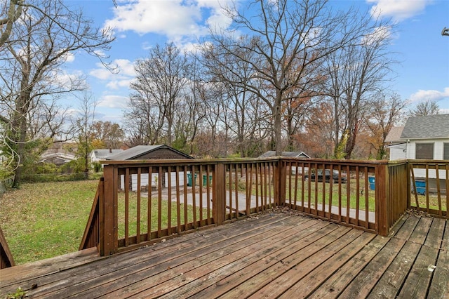 deck featuring a lawn