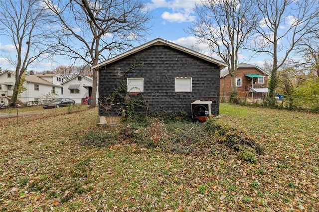 view of property exterior featuring a yard