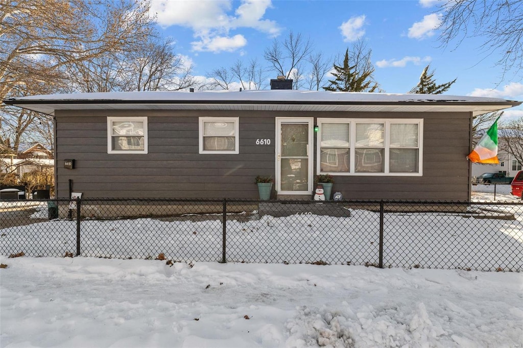 view of snow covered property