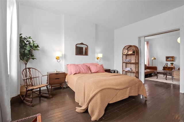 bedroom featuring dark wood-type flooring