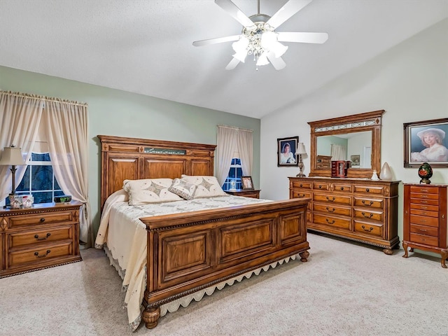 bedroom with light carpet, ceiling fan, and lofted ceiling